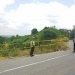 MENGANCAM: Jalan  Poros Sangatta-Bontang KM 23 mengancam keselamatan warga akibat jalanan rusak karena longsor.(Dhedy/Sangatta Post)
