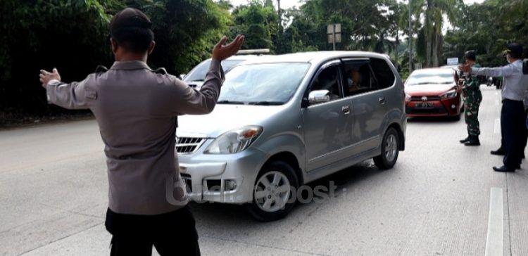 Operasi Yustisi pada Minggu (31/1/2021) di entry point Kecamatan Tenggarong Seberang, Kukar. (selasar)