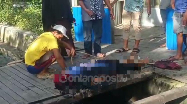 Pengendara sepeda motor tercebur ke selokan (Lutfi Rahmatunnisa'/bontangpost.id)