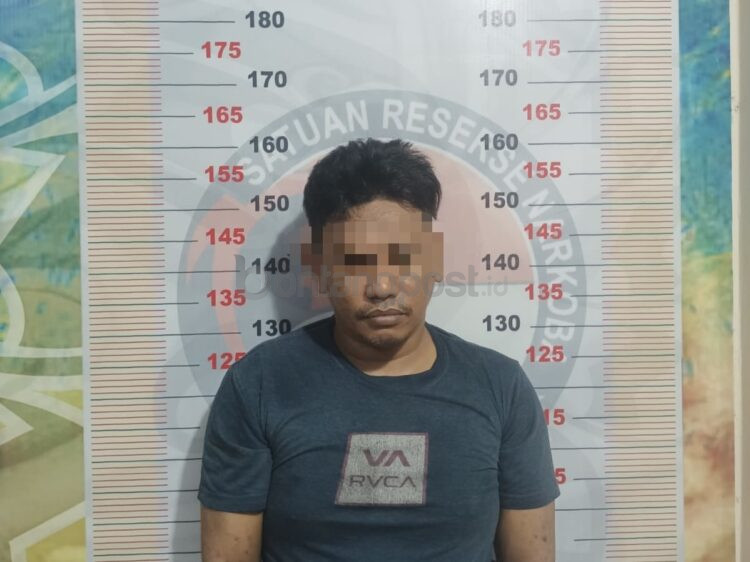 Tersangka Hamzah.