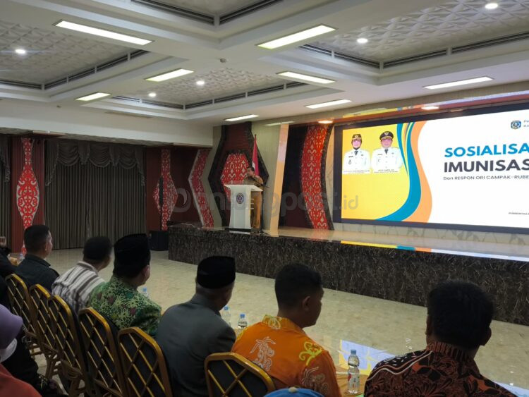 Wakil Wali Kota Bontang Agus Haris saat menyampaikan sambutan di depan seluruh Ketua RT dan Kader Posyandu se-Kota Bontang. (Dwi Kurniawan Nugroho / Bontang Post)