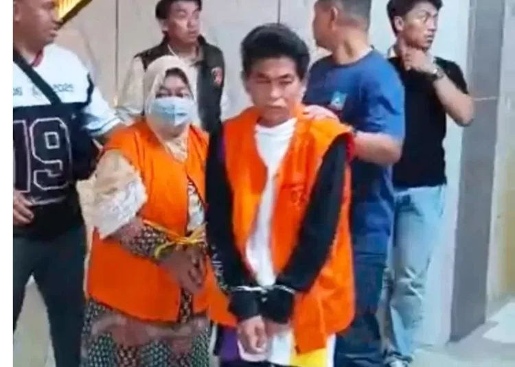 Wahyu dan Rusmini saat di Polresta Samarinda.