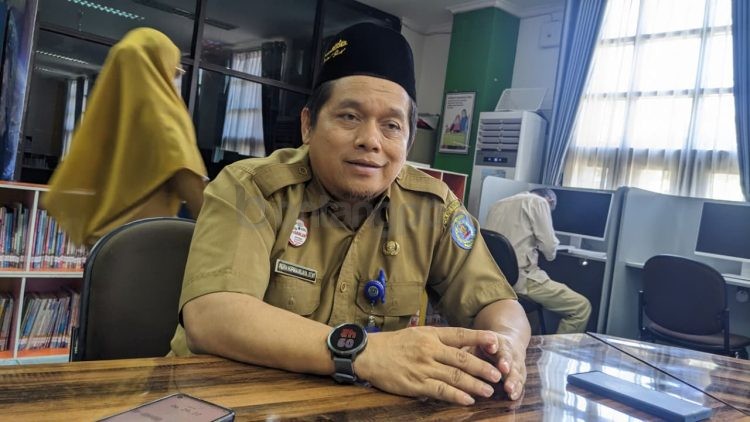 Kepala Bidang Perpustakaan DPK Bontang, Indra Nopika Wijaya, saat menjelaskan mekanisme lomba perpustakaan yang terbuka bagi seluruh peserta, termasuk yang belum terakreditasi.