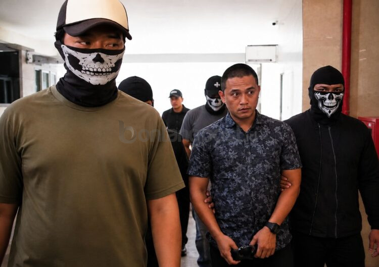 Ilustrasi polisi yang jadi beking Kampung Narkoba dipecat.